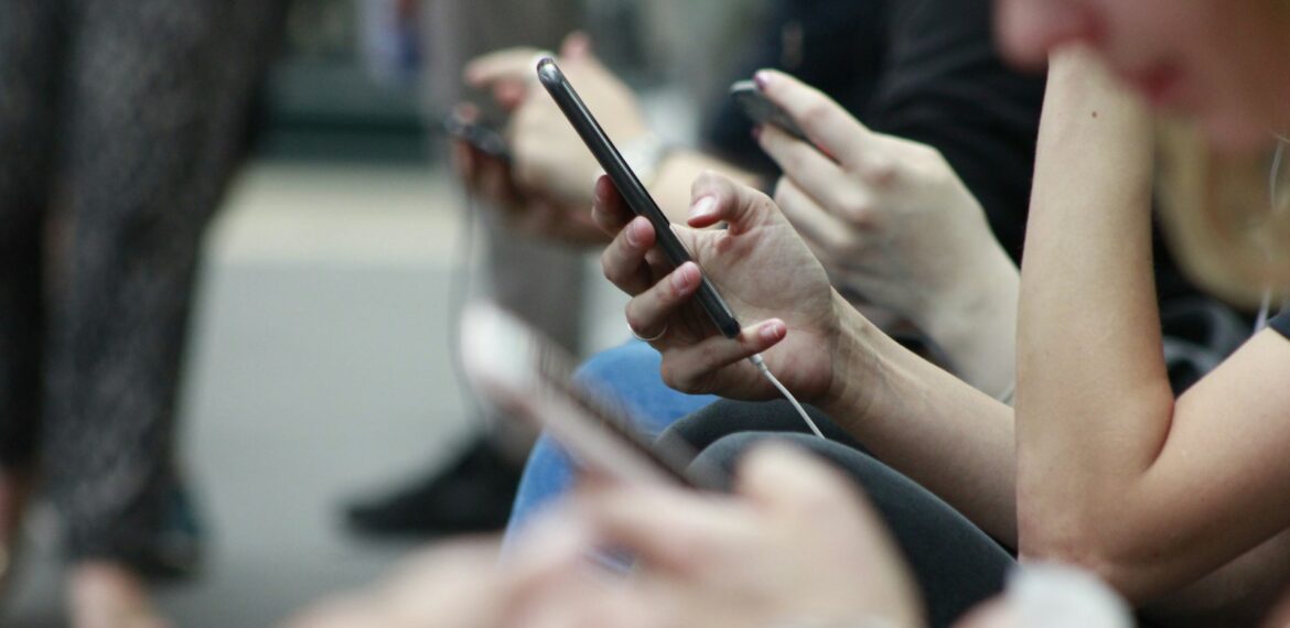 person holding black phone